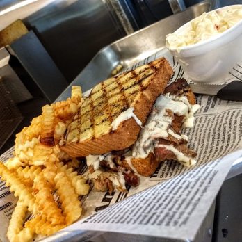County Line BBQ & Catering - Lil Bit of Texas - Texas toast sandwich with brisket, topped with queso. Combined with French fries and potato salad - Barbeque Near Me - Cedar Rapids, Iowa County Line BBQ & Catering - Lil Bit of Texas - Texas toast sandwich with brisket, topped with queso. Combined with French fries and potato salad - Barbeque Near Me - Cedar Rapids, Iowa