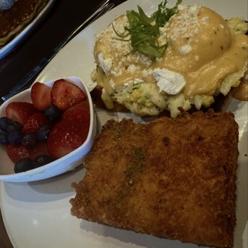 Biscottis - Cajun seafood Benedict, hash brown, fruit--so yummy. Peep my fiancé's delicious sweet potato pancake in the background - American Near Me - Jacksonville, Florida Biscottis - Cajun seafood Benedict, hash brown, fruit--so yummy. Peep my fiancé's delicious sweet potato pancake in the background - American Near Me - Jacksonville, Florida