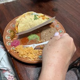 Beans and rice included with the tacos. Unbelievable value.
