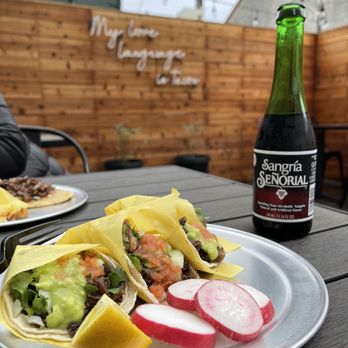 Zingo Tacos - Asada Tacos with Sangria at the back seating area - Mexican Near Me - Los Angeles, California Zingo Tacos - Asada Tacos with Sangria at the back seating area - Mexican Near Me - Los Angeles, California
