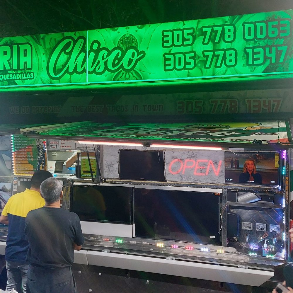 Taqueria Chisco Neon Sign and Truck Front Taqueria Chisco Neon Sign and Truck Front