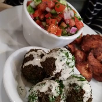 Oren's Hummus - Chicken skewer with 2 sides of falafel and Israeli salad. - Mediterranean Near Me - Mountain View, California