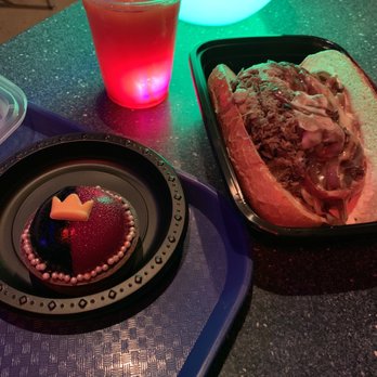 Tomorrowland Skyline Lounge - Blood orange slush, Queen of Hearts raspberry mousse tart, and pot roast Philly - Amusement Parks Near Me - Anaheim, California Tomorrowland Skyline Lounge - Blood orange slush, Queen of Hearts raspberry mousse tart, and pot roast Philly - Amusement Parks Near Me - Anaheim, California