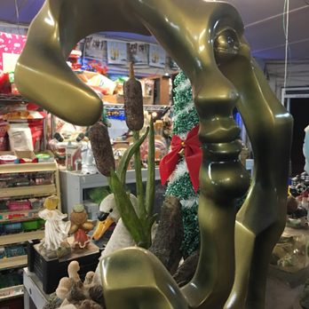 Smile Market - a bronze sculpture of a woman - Grocery Near Me - San Jose, California Smile Market - a bronze sculpture of a woman - Grocery Near Me - San Jose, California
