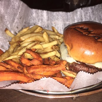 LoKal - Juan Fiddy Fiddy Burger served with half french fries half sweet potato fries. - Burgers Near Me - Miami, Florida LoKal - Juan Fiddy Fiddy Burger served with half french fries half sweet potato fries. - Burgers Near Me - Miami, Florida