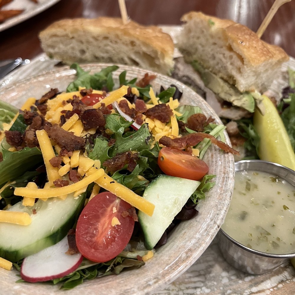 Fork Lore - Grilled Chicken Sandwich and side salad - Breakfast & Brunch Near Me - Asheville, North Carolina Fork Lore - Grilled Chicken Sandwich and side salad - Breakfast & Brunch Near Me - Asheville, North Carolina