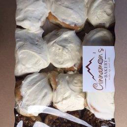 Cinnamon rolls with heavy frosting and pecan rolls