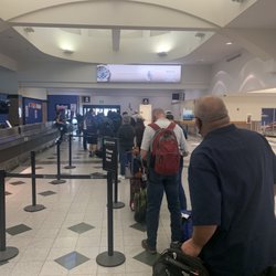 Budget Car Rental - 20 strong waiting for one employ to rent cars!