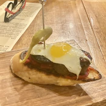 Urdaneta - Morcilla (house made blood sausage, quail egg, dad's peppers, piquillo jam, toasted bread) - Tapas/Small Plates Near Me - Portland, Oregon Urdaneta - Morcilla (house made blood sausage, quail egg, dad's peppers, piquillo jam, toasted bread) - Tapas/Small Plates Near Me - Portland, Oregon