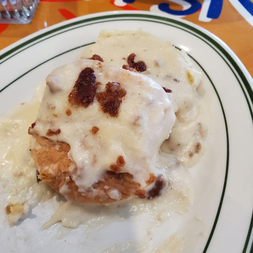 Sunshine Cafe - Bacon bits do not help this biscuit sausage gravy. - Breakfast & Brunch Near Me - Cathedral City, California Sunshine Cafe - Bacon bits do not help this biscuit sausage gravy. - Breakfast & Brunch Near Me - Cathedral City, California