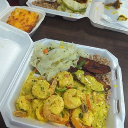 Coconut curry shrimp and goat curry entree's. Side of max and cheese, dirty rice cabbage and plantains Coconut curry shrimp and goat curry entree's. Side of max and cheese, dirty rice cabbage and plantains