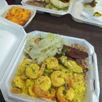 Island Flavorz - Coconut curry shrimp and goat curry entree's. Side of max and cheese, dirty rice cabbage and plantains - Caribbean Near Me - Houston, Texas Island Flavorz - Coconut curry shrimp and goat curry entree's. Side of max and cheese, dirty rice cabbage and plantains - Caribbean Near Me - Houston, Texas