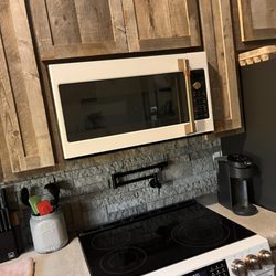 Flint Valley Home Services - Stone backsplash and pot fill.