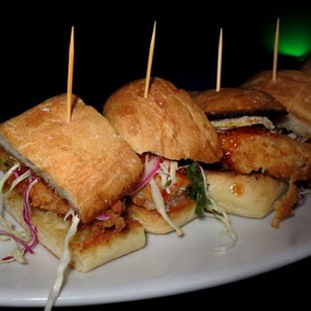 Wang Chung's - General Wang's Chicken Torta: China man meets mexican: housemade flied chicken fingers, orange gastrique, chili dust and house slaw. - Karaoke Near Me - Honolulu, Hawaii Wang Chung's - General Wang's Chicken Torta: China man meets mexican: housemade flied chicken fingers, orange gastrique, chili dust and house slaw. - Karaoke Near Me - Honolulu, Hawaii