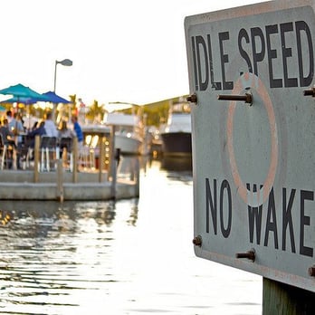 Black Point Marina - People having a good time at Black Point Ocean Grill. - Boating Near Me - Cutler Bay, Florida