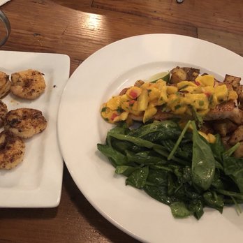 Cape Fear - Pan seared salmon with mango salsa and a side of grilled shrimp, sautéed spinach and roasted potatoes - Seafood Near Me - Wilmington, North Carolina Cape Fear - Pan seared salmon with mango salsa and a side of grilled shrimp, sautéed spinach and roasted potatoes - Seafood Near Me - Wilmington, North Carolina