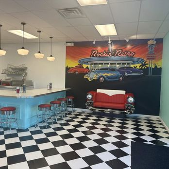 Rockin Retro Ice Cream Parlor - Enjoy themed murals by one of our local artists. - Ice Cream & Frozen Yogurt Near Me - Cocoa Beach, Florida Rockin Retro Ice Cream Parlor - Enjoy themed murals by one of our local artists. - Ice Cream & Frozen Yogurt Near Me - Cocoa Beach, Florida
