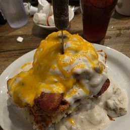 Morning Wrecker: biscuit, hashbrowns, chicken fried steak, scrambled eggs, bacon, country gravy with sausage, and cheese. Morning Wrecker: biscuit, hashbrowns, chicken fried steak, scrambled eggs, bacon, country gravy with sausage, and cheese.