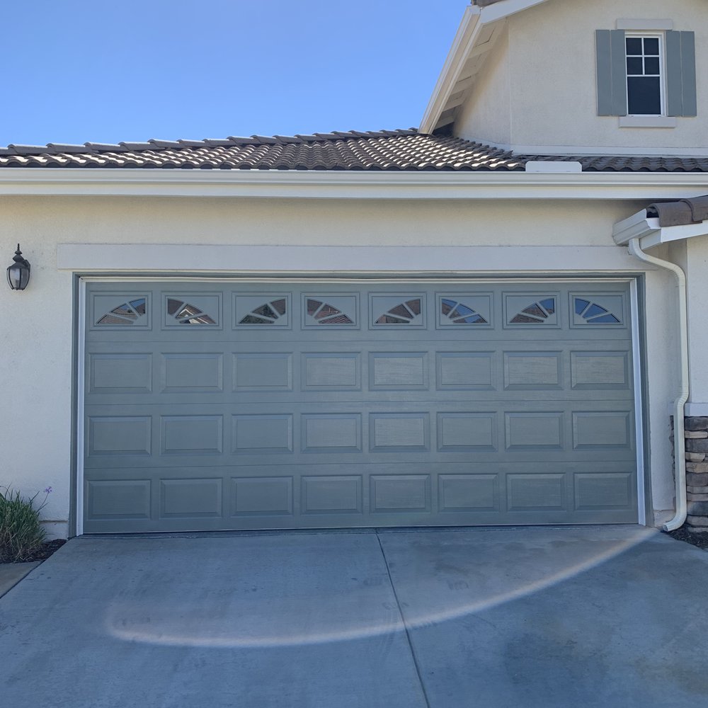 Simply Gutters - Front of House - above garage door - Gutter Services Near Me Simply Gutters - Front of House - above garage door - Gutter Services Near Me