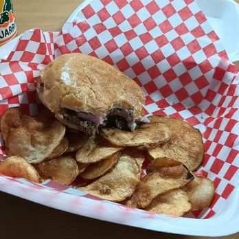 The Cuban Hut - Cuban sandwich (2/3 gone) and potato chips - Cuban Near Me - Temecula, California The Cuban Hut - Cuban sandwich (2/3 gone) and potato chips - Cuban Near Me - Temecula, California