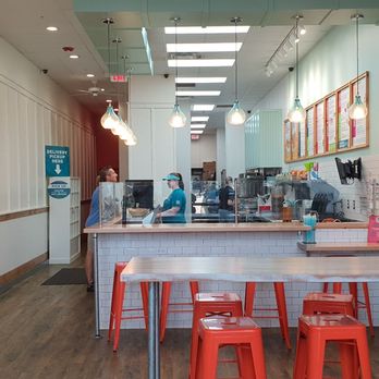 Tropical Smoothie Cafe - The inside of Tropical Smoothie Cafe. - Juice Bars & Smoothies Near Me - Webster, New York