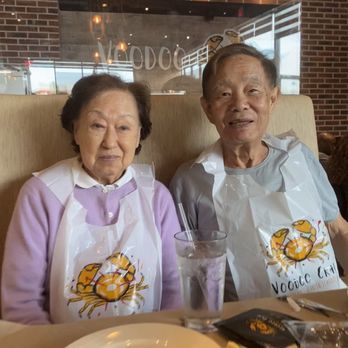 Voodoo Crab - Centereach - My Octogenarian Parents all bibbed up excited to eat dinner! - Seafood Near Me - Centereach, New York