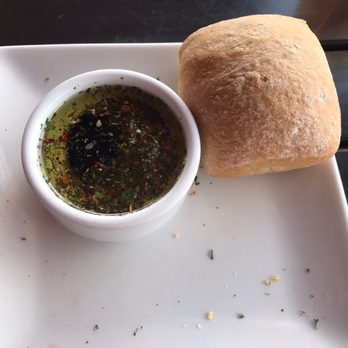 E & E Stakeout Grill - Roll with herbed olive oil/balsamic vinegar - American Near Me - Belleair Bluffs, Florida E & E Stakeout Grill - Roll with herbed olive oil/balsamic vinegar - American Near Me - Belleair Bluffs, Florida