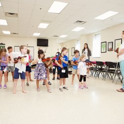 Queen City Suzuki Violin - Group classes build a sense of community among Suzuki students. They learn and progress faster while watching their peers.