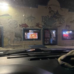 Dirty Al's - Outside watching the TV video shows very good looking battered shrimp but that's not what you get served.