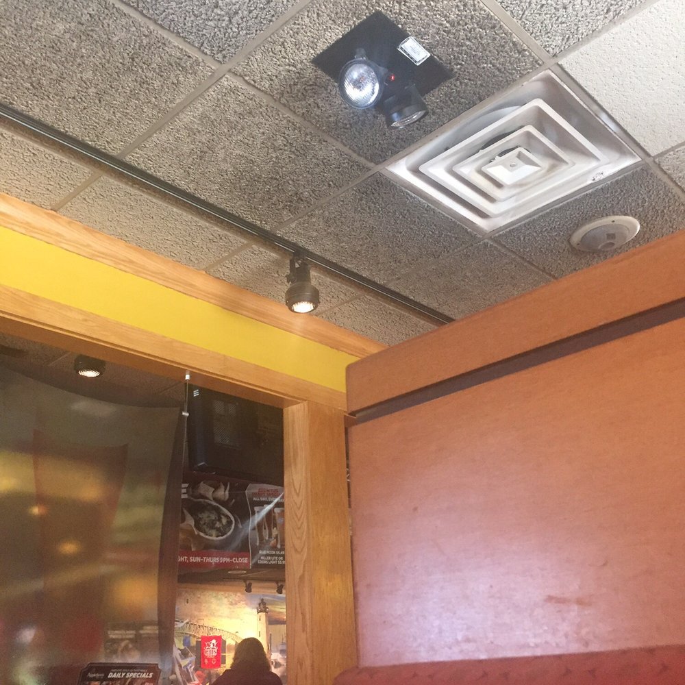 The gray ceiling with black dirt marks around the vent. Also very close to customers food. The gray ceiling with black dirt marks around the vent. Also very close to customers food.