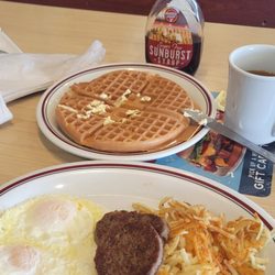 Huddle House - Trad platter saus hash browns eggs O/M Has toast did not have toast because today is waffle Wed anything over 6 bucks free waffle. Cawfee