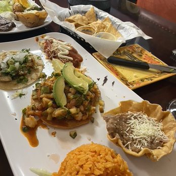 Chilo's Mexican Grill - Combo platter with a fish taco, ceviche tostada, and a cheese enchilada - Mexican Near Me - Crystal Lake, Illinois Chilo's Mexican Grill - Combo platter with a fish taco, ceviche tostada, and a cheese enchilada - Mexican Near Me - Crystal Lake, Illinois