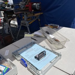 Acme Sharpening - His station at the farmers market. Saturday is when.