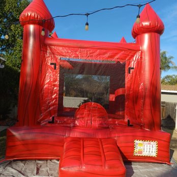 Bexters & Daniel’s Jumpers - Red Cherry inflatable jumper. - Bounce House Rentals Near Me