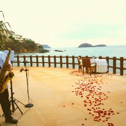 Capella Ixtapa - Romantic dinner setup and live musician