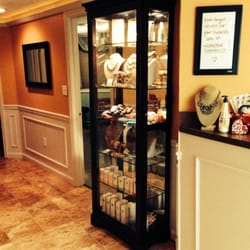 Radiance Skin Care Salon - Jewelry & products on display in a beautiful curio cabinet!