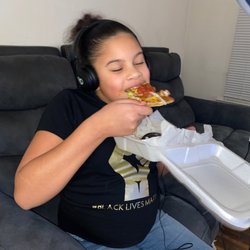 Nacho Average Tostado - Myah loving her 1st (of many more to come!!!) Tostado! EXCELLENT food with the best service @ Nacho Average Tostado food truck!