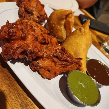 Raj's Indian Kitchen - Vegetable samosa and onion bhajiyas - Indian Near Me - Long Island City, New York Raj's Indian Kitchen - Vegetable samosa and onion bhajiyas - Indian Near Me - Long Island City, New York