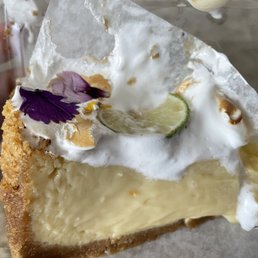 My squished Key Lime pie (sat in my warm car for 40 min but it still tasted good!!!) My squished Key Lime pie (sat in my warm car for 40 min but it still tasted good!!!)