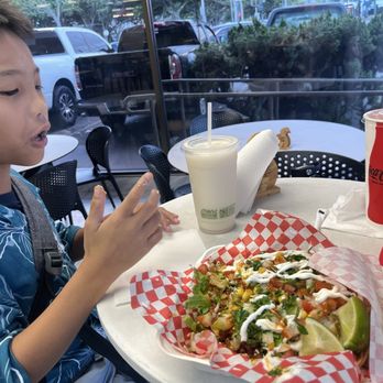 Jalapenos 808 - My son and our Nachos. Isn't it huge?! - Mexican Near Me - Kailua, Hawaii Jalapenos 808 - My son and our Nachos. Isn't it huge?! - Mexican Near Me - Kailua, Hawaii