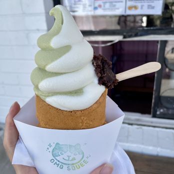 Omg Squee - Matcha and Cereal Milk Swirl Soft Serve Taiyaki with Red Bean Topping - Desserts Near Me - Austin, Texas