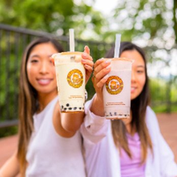 Teapioca Lounge - Zaragoza Shops - two women holding up their drinks - Bubble Tea Near Me - El Paso, Texas Teapioca Lounge - Zaragoza Shops - two women holding up their drinks - Bubble Tea Near Me - El Paso, Texas