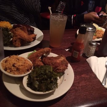 Amy Ruth's - Rice & beans, collard greens and fried chicken (white meat). Beverage: half & half. - Southern Near Me - New York, New York