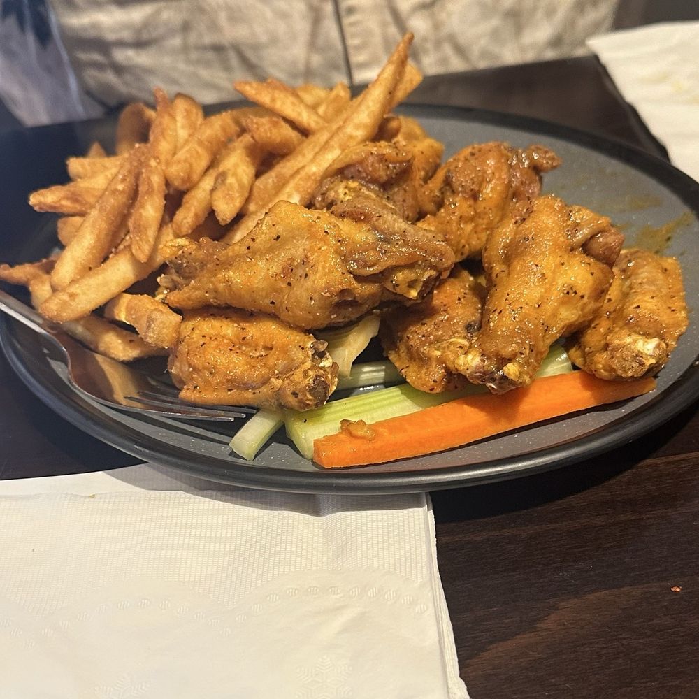 10 wings and a side of fries. 10 wings and a side of fries.