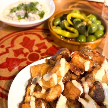 Barcelona - Delicious braised beef, olives and potato tapas - Spanish Near Me - Columbus, Ohio
