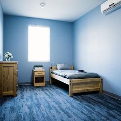 STR Behavioral Health Silver Pines: Interior photo of one of our bedrooms at our addiction and mental health treatment center.