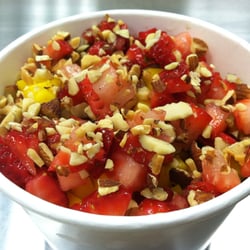 Beach Bowls Acai Cafe - Organic oatmeal topped with strawberries and almond slices