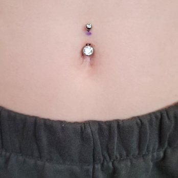 357 Ink - Purple mark is the pen where it was marked before it was pierced. - Tattoo Near Me - McKinney, Texas 357 Ink - Purple mark is the pen where it was marked before it was pierced. - Tattoo Near Me - McKinney, Texas