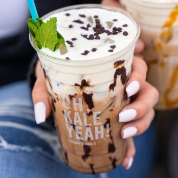 First Watch - a woman holding a cup of iced coffee - Breakfast & Brunch Near Me - Willis, Texas First Watch - a woman holding a cup of iced coffee - Breakfast & Brunch Near Me - Willis, Texas