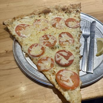 Lazy Moon Pizza - Saganaki slice with roma tomatoes - Pizza Near Me - Orlando, Florida Lazy Moon Pizza - Saganaki slice with roma tomatoes - Pizza Near Me - Orlando, Florida